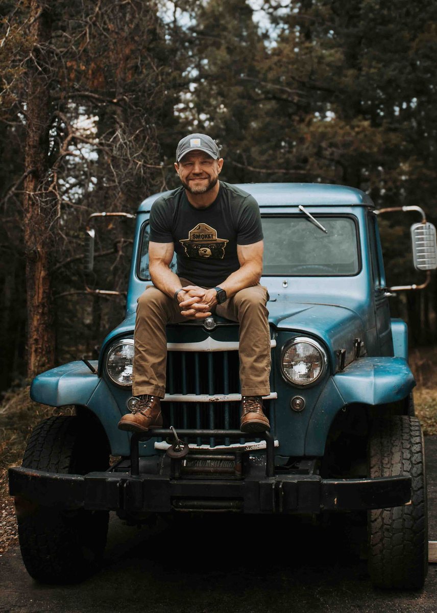Danny, founder of Lazy Bear Woodworks, in the Colorado pines